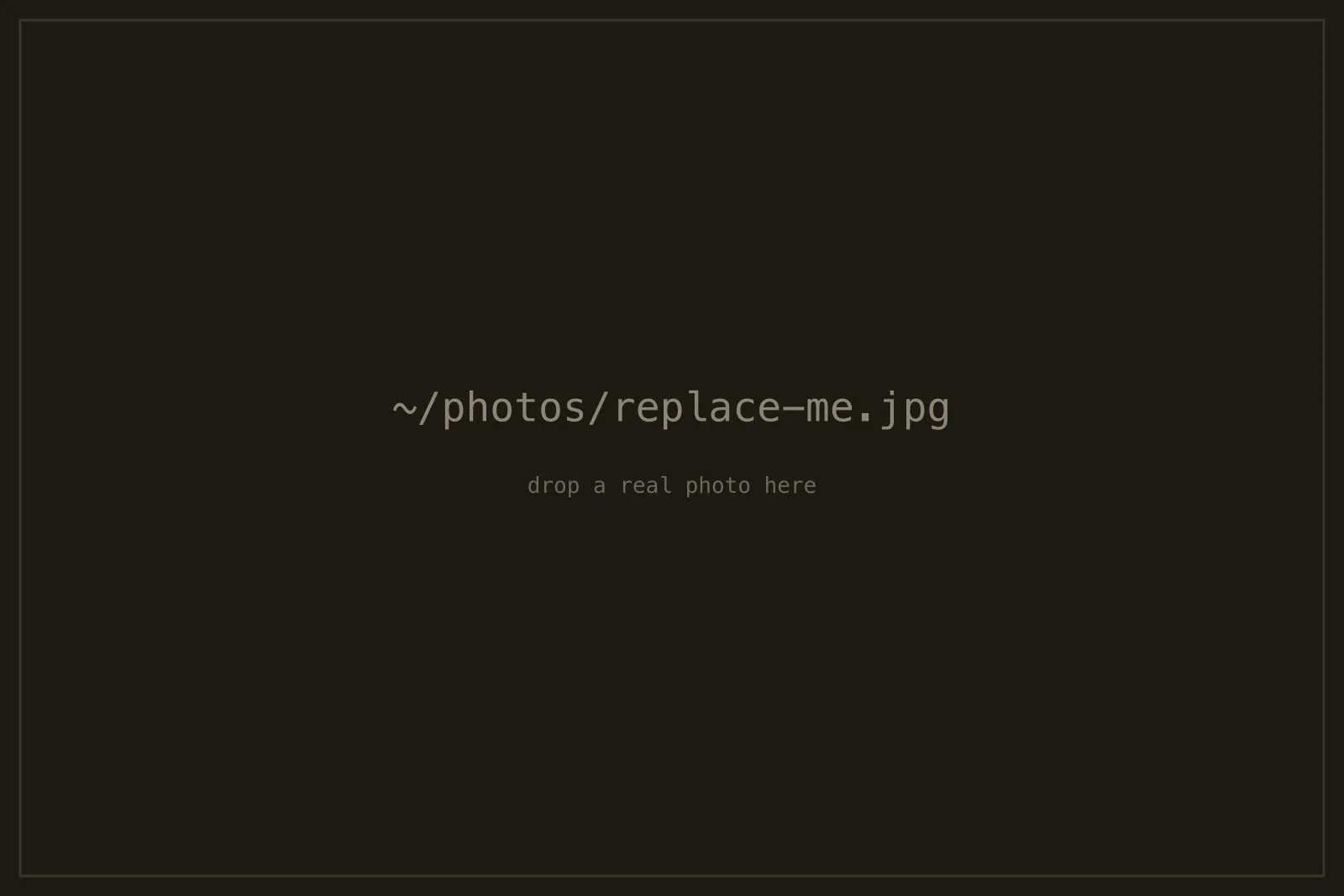 A dark placeholder image reading "replace me".